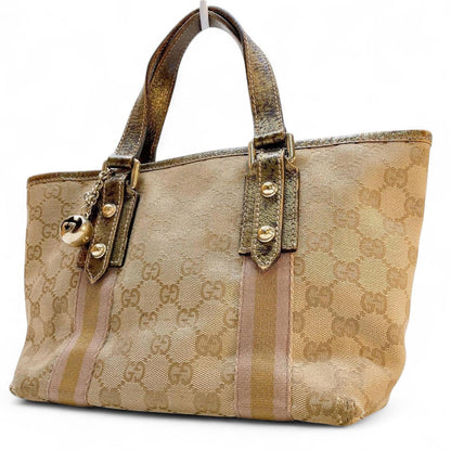 Gucci - Beige Monogram Canvas Handbag with Gold Accents