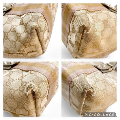 Gucci - Beige Monogram Canvas Handbag with Gold Accents