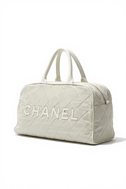 Chanel - Quilted Leather Handbag Boston CC