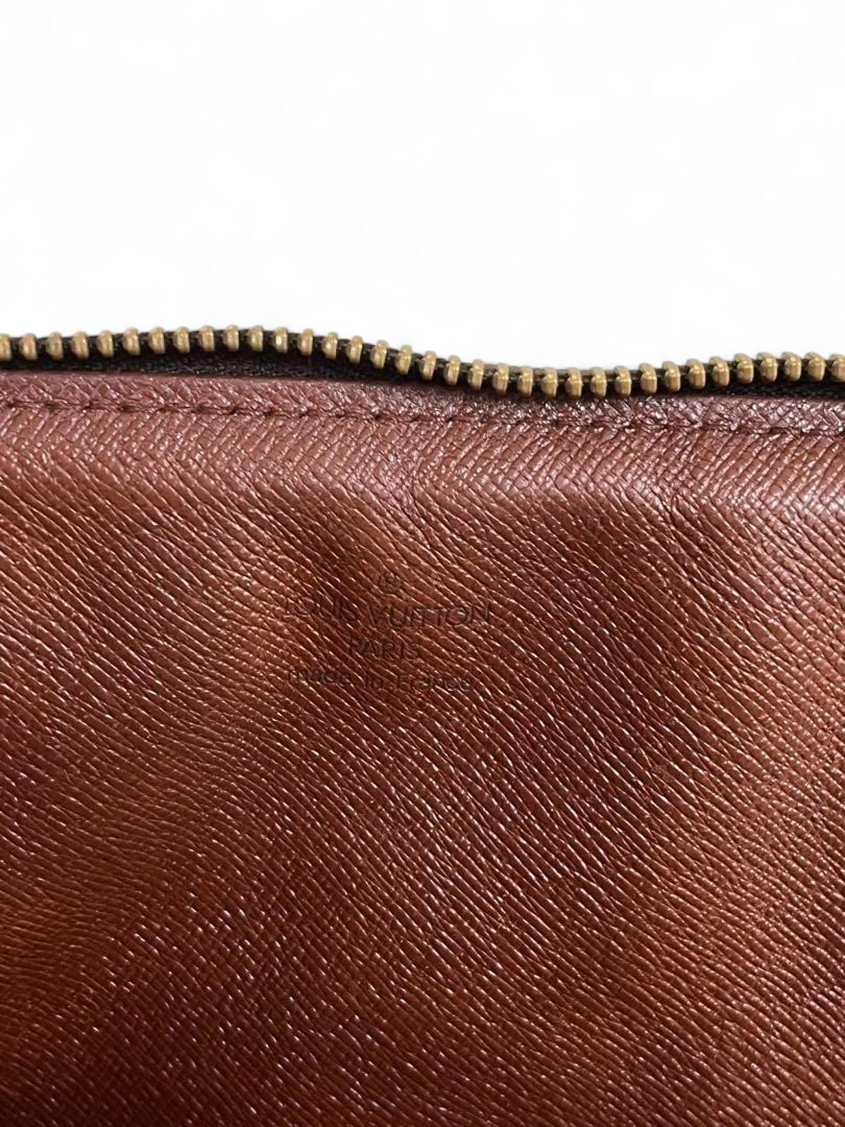 Louis Vuitton - Monogram Canvas Clutch Bag