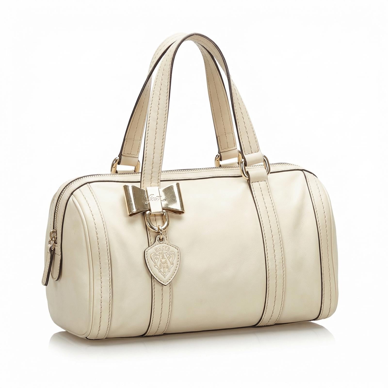 Gucci  - Cream Leather Handbag Gold Bow Charm