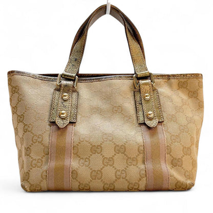 Gucci - Beige Monogram Canvas Handbag with Gold Accents