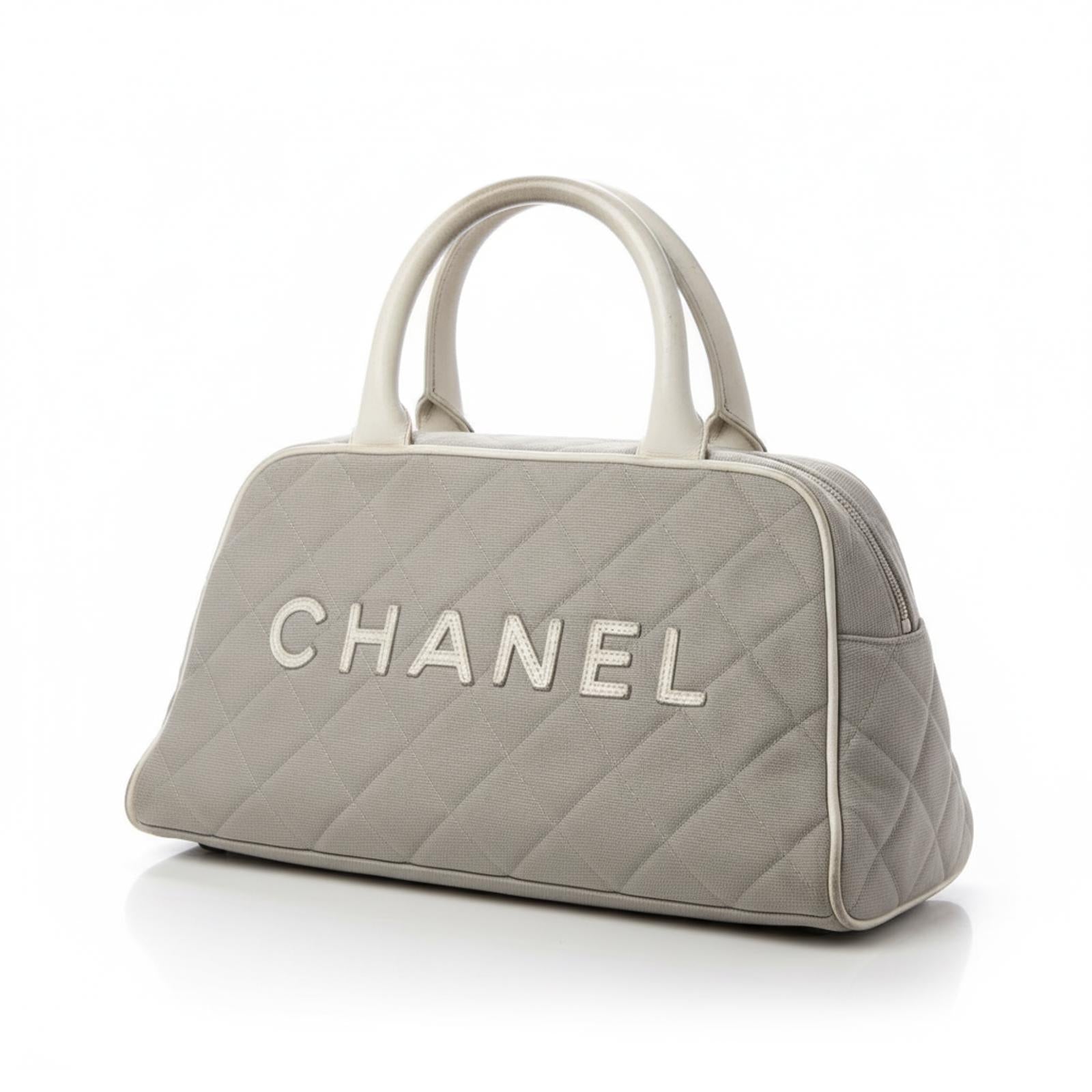 Chanel - Quilted Canvas Handbag Logo